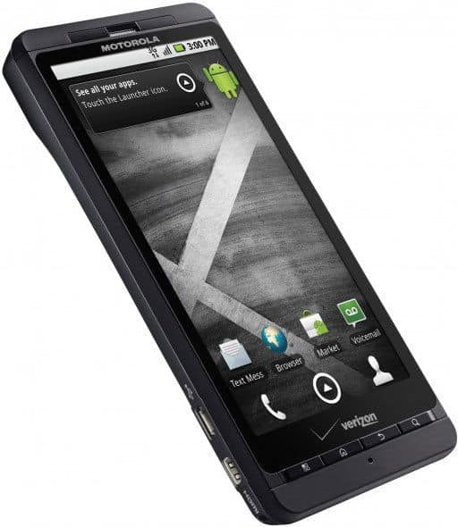 Motorola Droid X front view, black smartphone with touchscreen displaying home screen and Android logo
