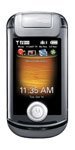 Front view of a small silver Motorola Krave flip phone with color display, showing 11:35 AM and circular navigation button.