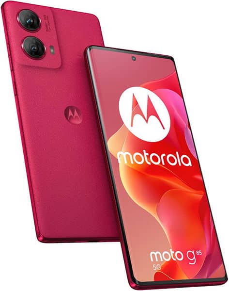 Motorola Moto G85 in pink, shown front and rear views with dual rear cameras and illuminated display showing the Motorola logo