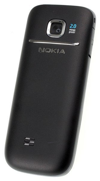 Rear view of black Nokia 2730 Classic showing camera with "2.0 mega pixel," speaker grille, and centered Nokia branding.