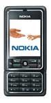 Nokia 3250 XpressMusic front view, displaying Nokia logo on screen above numeric keypad and navigation controls