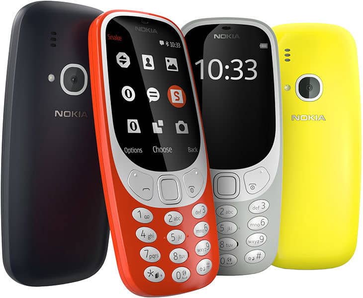 Nokia 3310 (2017) in black, red, and yellow, displayed front and rear views showing keypad and curved back design