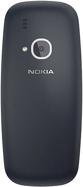 Nokia 3310 (2017), rear view, showing dark gray curved body with camera lens and Nokia branding