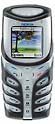 Nokia 5100 mobile phone, front view, showing silver and dark gray exterior with small screen display and numeric keypad