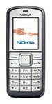 Nokia 6070 front view, showing keypad and small screen displaying Nokia logo
