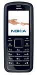 Nokia 6080 mobile phone, front view, with black body and small display screen showing Nokia logo