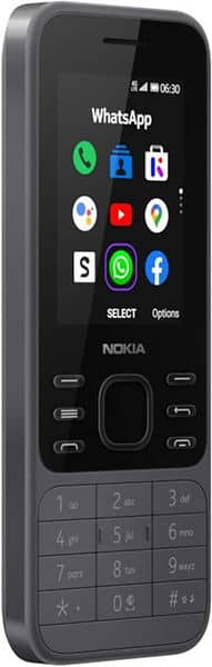 Nokia 6300 4G front view with screen displaying WhatsApp and other app icons, physical numeric keypad below