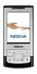 Nokia 6500 Slide front view with screen displaying Nokia logo and device name