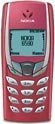 Nokia 6590i mobile phone, front view, with burgundy casing and small screen displaying time and battery indicator