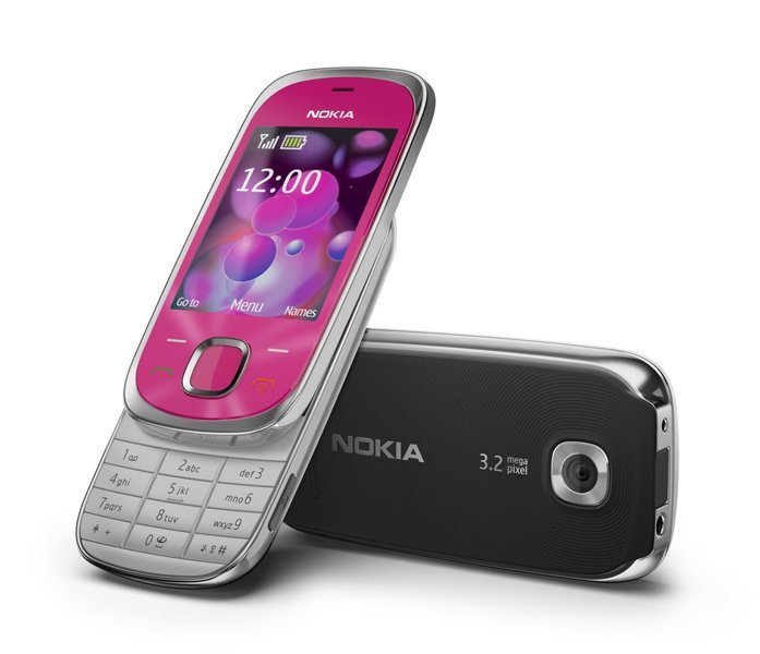 Nokia 7230 front and rear view, showing magenta screen with time display and silver keypad, with black back panel and camera