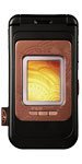 Nokia 7390 phone with internal screen displayed, showing a sunset landscape image on the inner display