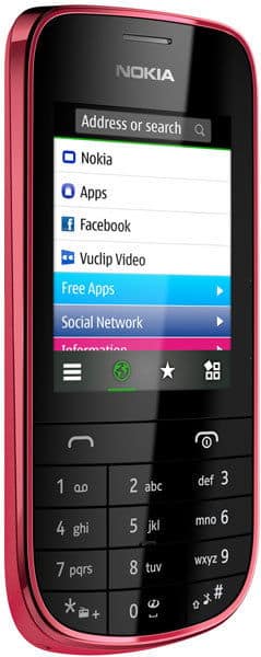 Nokia Asha 203 front view, pink phone with screen showing menu options including Free Apps and Social Network, numeric keypad below