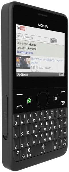 Nokia Asha 210 front view, displaying YouTube search interface on screen with QWERTY keyboard below