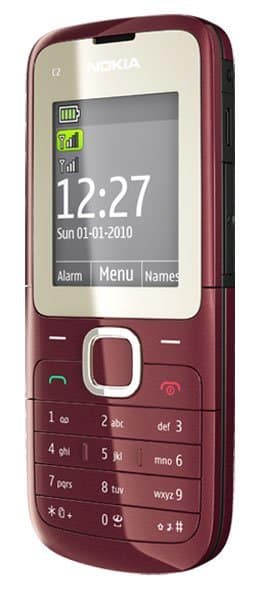 Nokia C2-00 front view, burgundy candybar phone with small screen displaying time and date, numeric keypad below