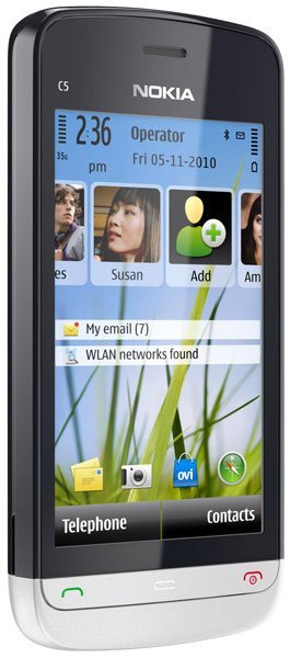 Nokia C5-03 smartphone, front view, displaying home screen with contacts, messages, and app icons