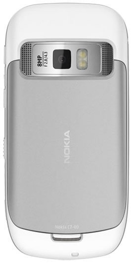 Nokia C7 rear view, white phone with camera, speaker grille, and flash visible on back panel