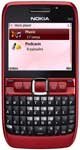Front view of a red Nokia E63 with QWERTY keyboard, showing music and podcast menu on the display.