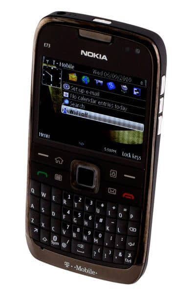 Nokia E73 Mode front view with QWERTY keyboard, display showing home screen with application icons and T-Mobile branding