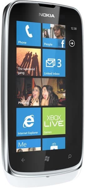 Nokia Lumia 610 front view with Windows Phone home screen showing tiles for Phone, People, Mail, Photos, Internet Explorer, Xbox Live, and Me