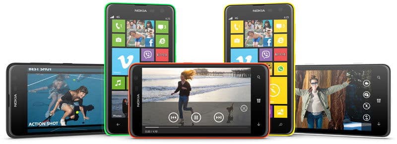 Nokia Lumia 625 in green, black, and yellow, displayed from front and side angles showing colorful tile home screen and video playback interface