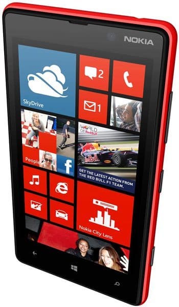 Nokia Lumia 820 front view, red and black phone with Windows home screen displaying tiles for SkyDrive, Messages, Phone, People, Facebook, Music, and other apps