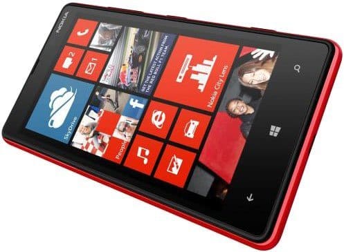 Nokia Lumia 820 smartphone displayed from front-left angle, red body with colorful app tiles on screen showing Windows Phone interface