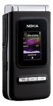 Nokia N75 flip phone, open position, showing purple-tinted display screen and keypad
