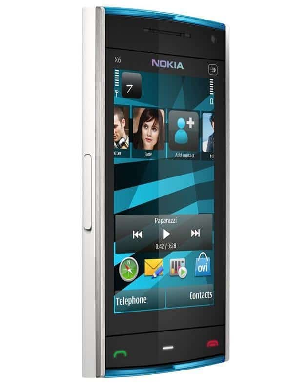 Nokia X6 front view with blue metallic frame, displaying home screen with contacts, music player, and app icons