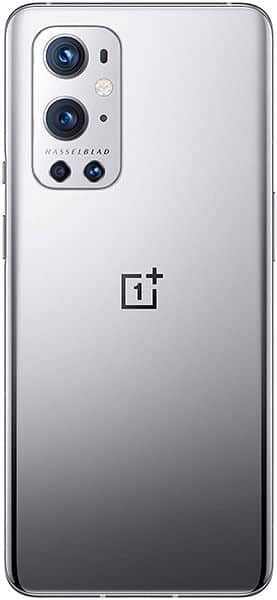 Rear view of silver OnePlus 9 Pro showing four rear cameras, flash in top left, and centered OnePlus logo on the back panel.