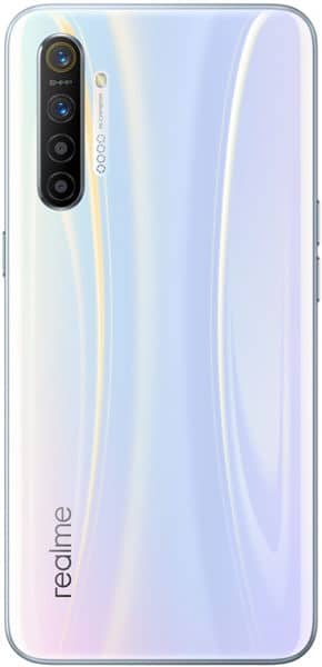 Rear view of Realme X2 showing vertical quad cameras with flash, glossy white back, and Realme logo at lower left.