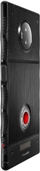 Red Hydrogen One smartphone, rear side view: black, textured grip, large back camera, red button near bottom, connector pins visible.