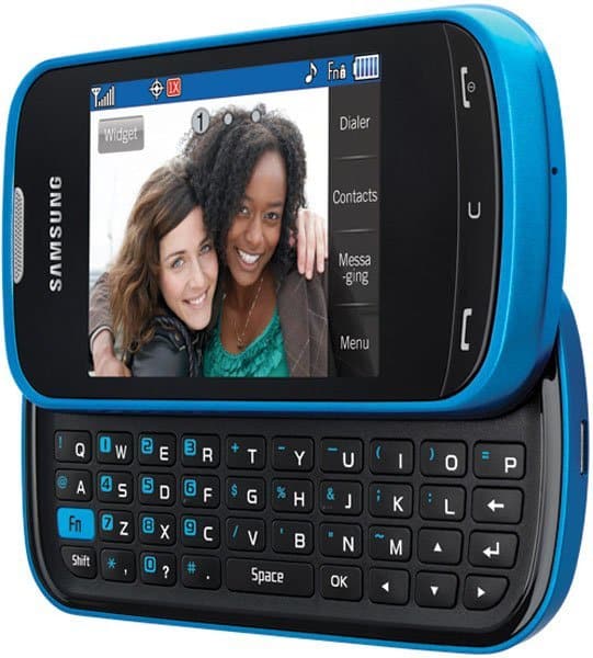 Samsung Character phone, blue and black, displaying photo of two women on screen with slide-out QWERTY keyboard below