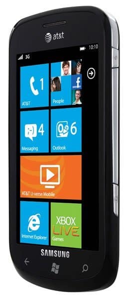 Samsung Focus front view displaying home screen with colorful app tiles including AT&T, People, Messaging, Outlook, and Xbox Games on Windows Phone interface