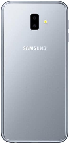 Samsung Galaxy J6+ rear view showing silver back panel, dual camera with LED flash, and Samsung branding
