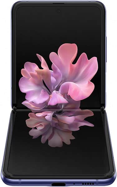 Samsung Galaxy Z Flip open, displaying pink flower on screen with reflection on lower display panel against black background