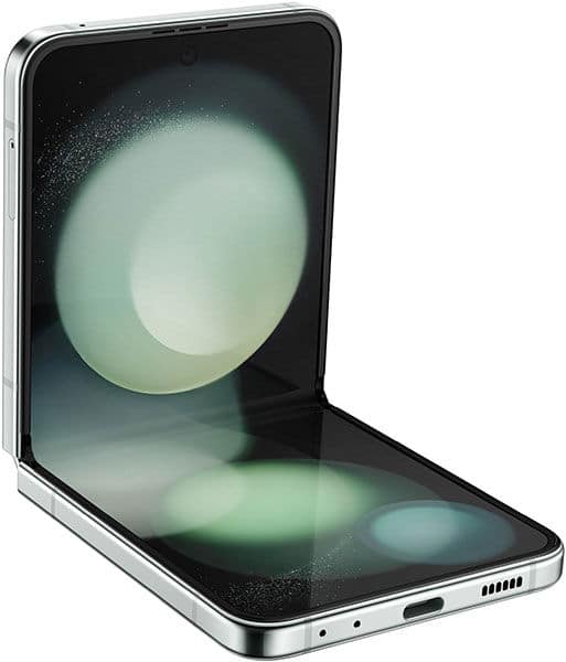 Samsung Galaxy Z Flip5, front view, half-open at 90°, showing screen with green and white circles; charging port visible below.