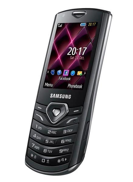 Samsung S5350 Shark front view, black candybar phone with pink geometric display showing time and app icons