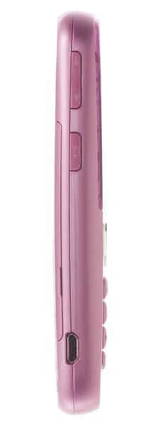 Sanyo Juno flip phone, side view, showing pink exterior with buttons and ports