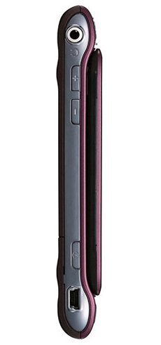 Sidekick LX 2009 front view, showing narrow dark rectangular phone body with silver trim, circular camera lens at top, and side buttons