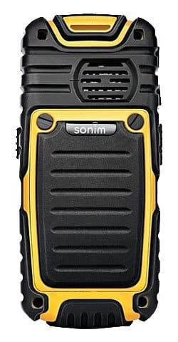 Rear view of rugged black and yellow Sonim XP3 Enduro, showing textured back, exposed screws, and top speaker grille.