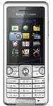 Front view of silver Sony Ericsson C510 showing small color display with app icons and physical keypad below the screen.