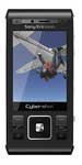 Front view of black Sony Ericsson C905 showing screen with skydiver image and visible control buttons below the display.