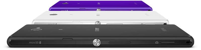 Sony Xperia M2 smartphones stacked in black, white, and purple, rear view showing camera and ports