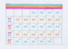 Weekly planner with color-coded sections for scheduling tasks and events across seven days