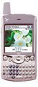 Treo 600 smartphone, front view, showing screen with map application and physical keyboard below