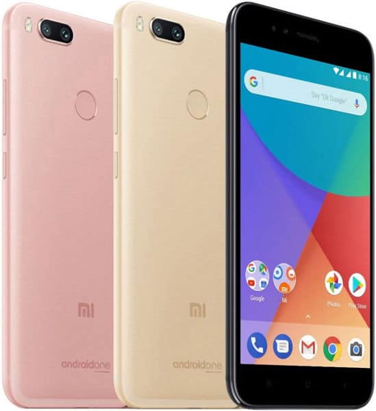 Xiaomi Mi A1 in pink, gold, and black, shown from rear and front angles displaying dual camera and colorful home screen