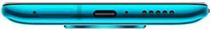 Xiaomi Poco F2 Pro smartphone in cyan blue, bottom edge view showing speaker grilles and ports