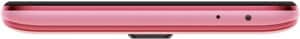 Xiaomi Poco X2 smartphone shown from the top edge, displaying pink body with speaker grille and ports