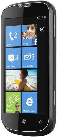 Front view of black ZTE Render showing Windows Phone interface with app tiles on screen, including Phone, People, and Facebook.