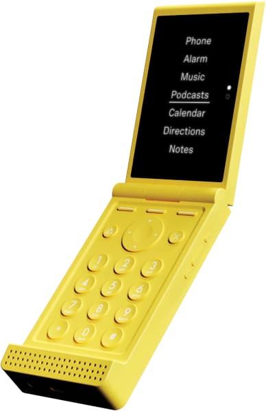 Light Flip yellow flip phone, open, displaying menu with Phone, Alarm, Music, Podcasts, Calendar, Directions, and Notes options on screen